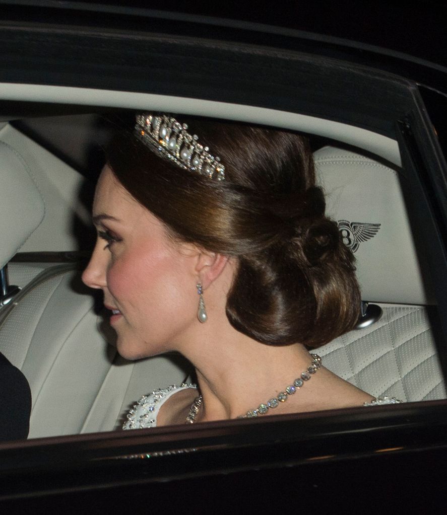 Kate styled her hair in a low chignon with the Lover's Knot tiara in 2017