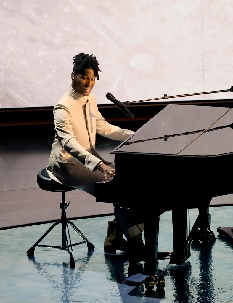 Jon Batiste performs 'It Never Went Away' from "American Symphony" onstage during the 96th Annual Academy Awards at Dolby Theatre on March 10, 2024 in Hollywood, California.