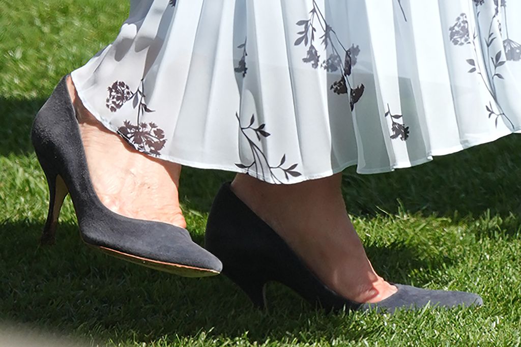 Carole Middleton's heel stuck in the grass at Royal Ascot