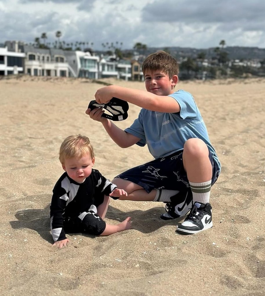 Photo shared by Heather Rae El Moussa on Instagram March 2024 of her husband Tarek El Moussa's son Brayden (who he shares with Christina Hall) playing at the beach with their son Tristan.