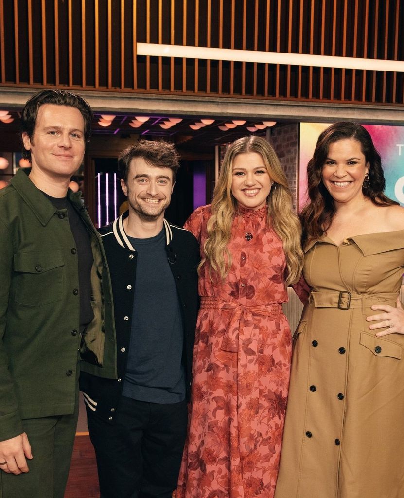 Kelly with her guests on her talk show