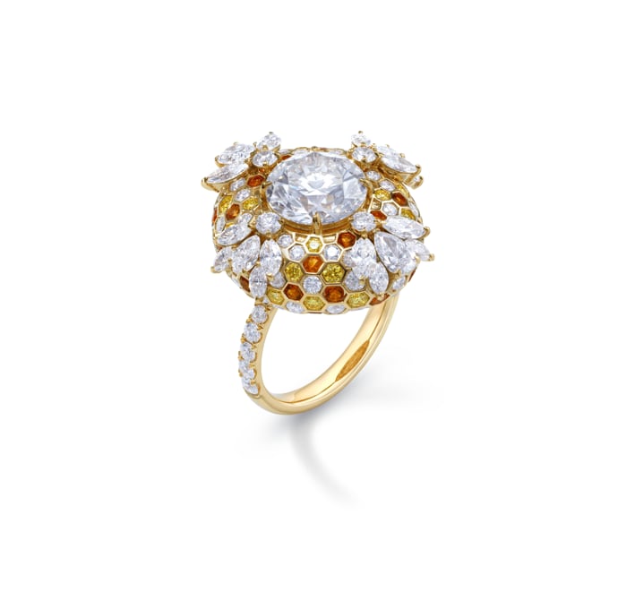  ring featuring a large central diamond