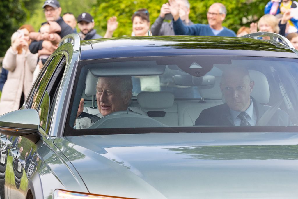 King Charles waved to onlookers in Sandringham