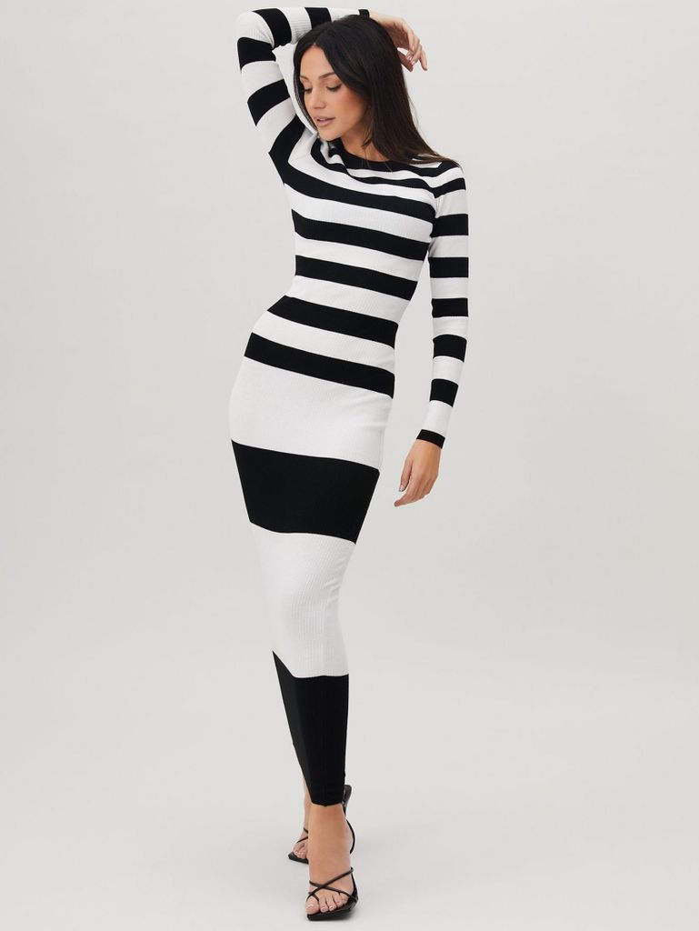Michelle Keegan modelling striped bodycon dress in white and black for Very