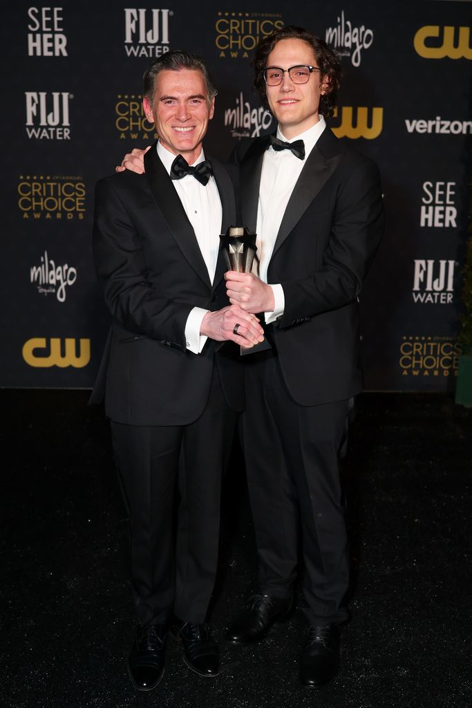 Billy Crudup, winner of the Best Supporting Actor in a Drama Series award for "The Morning Show," and William Atticus Parker pose in the press room during the 29th Annual Critics Choice Awards at Barker Hangar on January 14, 2024 in Santa Monica, California.