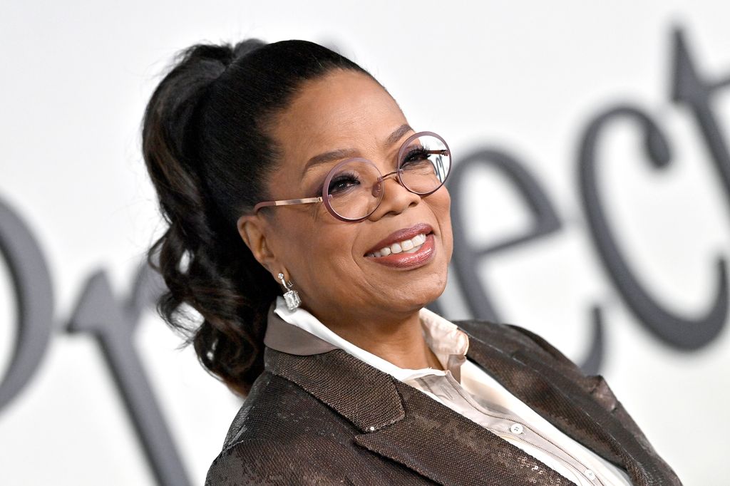 Oprah Winfrey smiling with ponytail