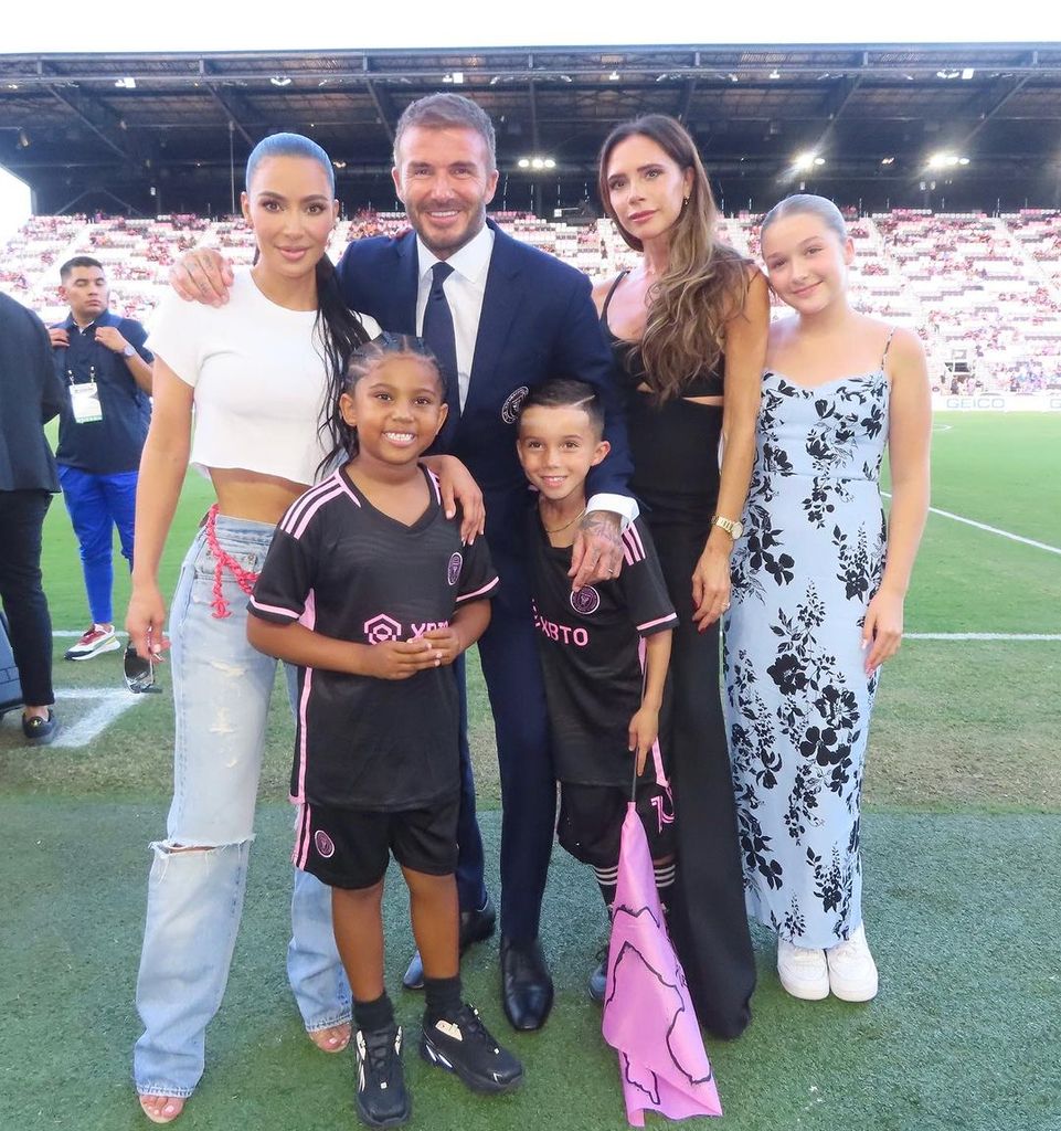 Kim Kardashian with David Beckham, wife Victoria and daughter Harper 