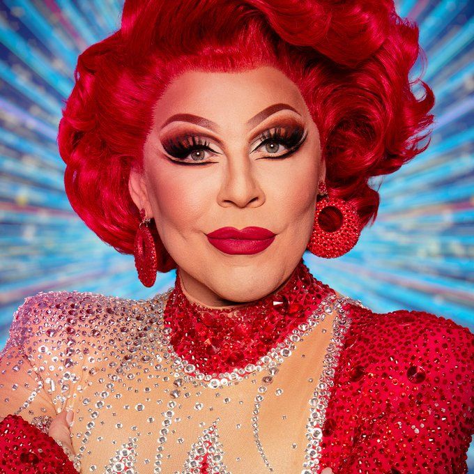 headshot person with red hair