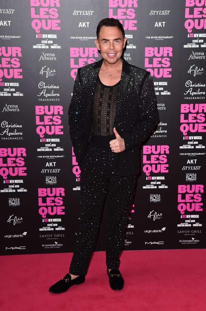 Chris Dennis in a black sequin outfit