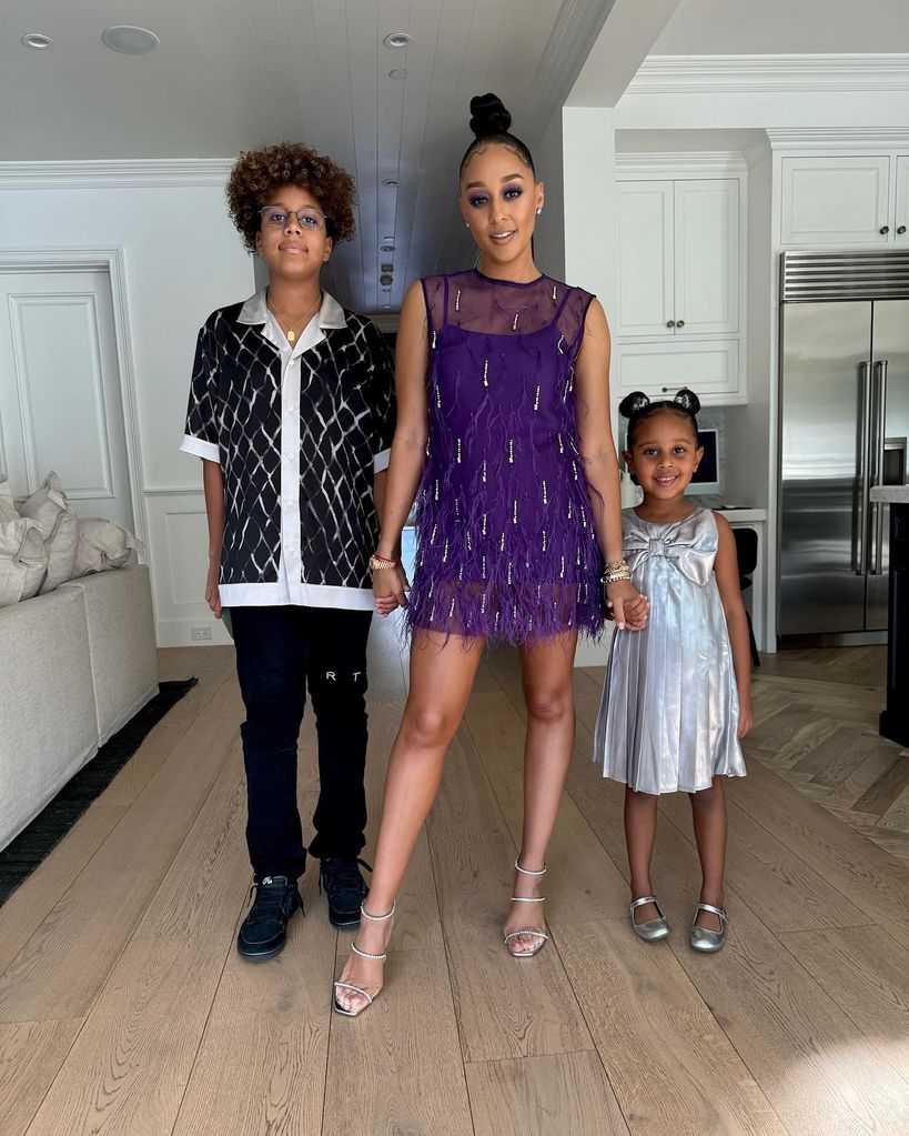 tia mowry with two kids 