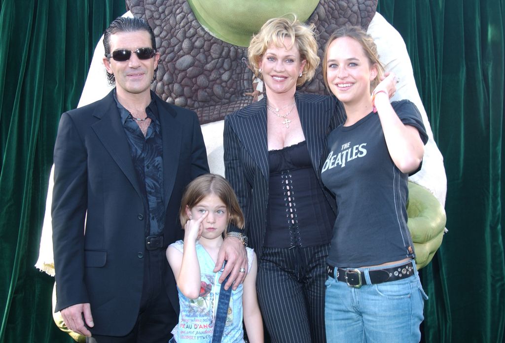 Antonio Banderas, wife Melanie Griffith, daughters Stella Banderas and Dakota Johnson at the Shrek 2 premiere in 2004