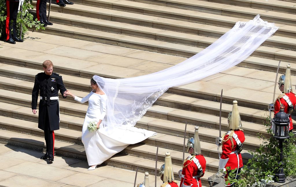 The Duchess of Sussex showed off her flowing veil as she left St George's Chapel