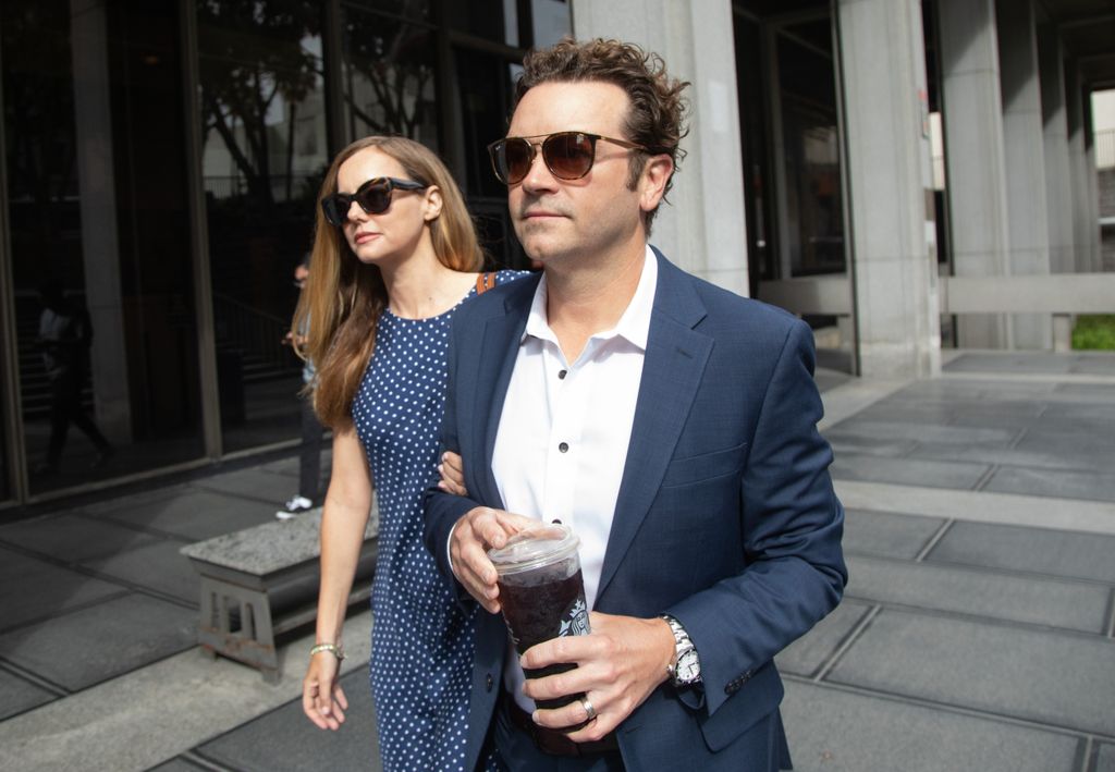 Danny Masterson arrives at Clara Shortridge Foltz Criminal Justice Center in Los Angeles with wife Bijou in May 2023