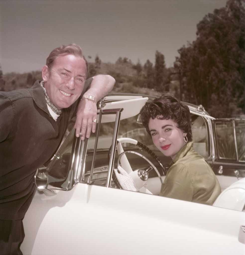 British-born American actress Elizabeth Taylor (1932 - 2011) with her husband, British actor Michael Wilding (1912 - 1979), circa 1955.