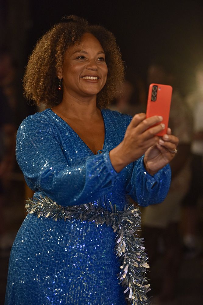 Angela Griffin wearing a blue sparkly dress in the Death in Paradise Christmas special