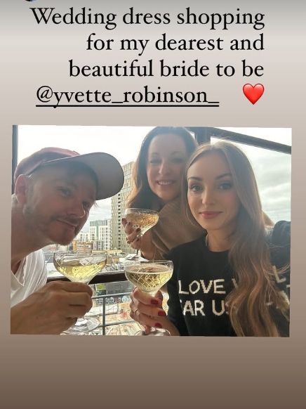 Helen George with a male friend and a female friend holding glasses of wine