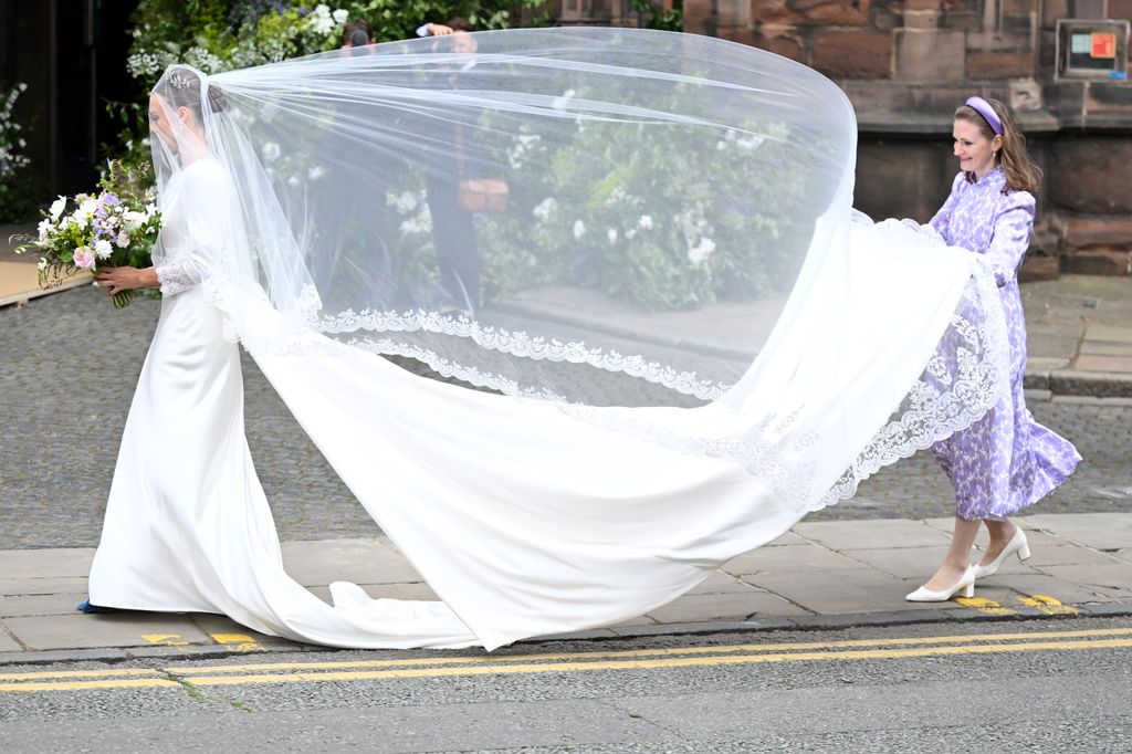 A photo of Olivia Henson walking into the Chester Cathedral