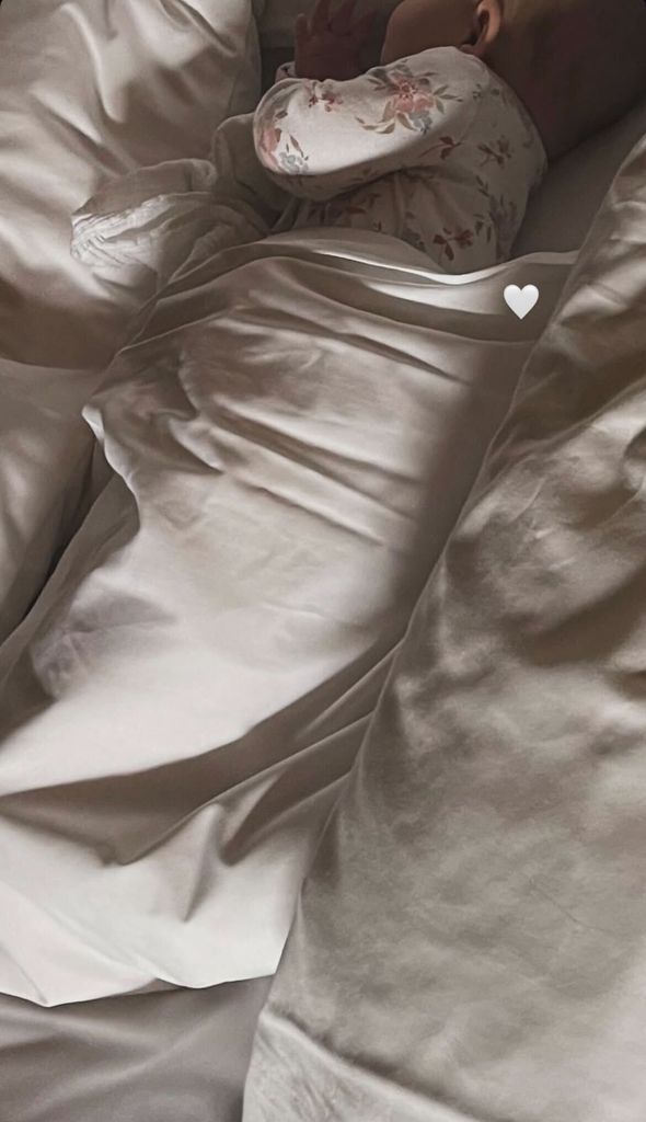 Michelle and Mark's daughter Palma looked super cosy as she cuddled up