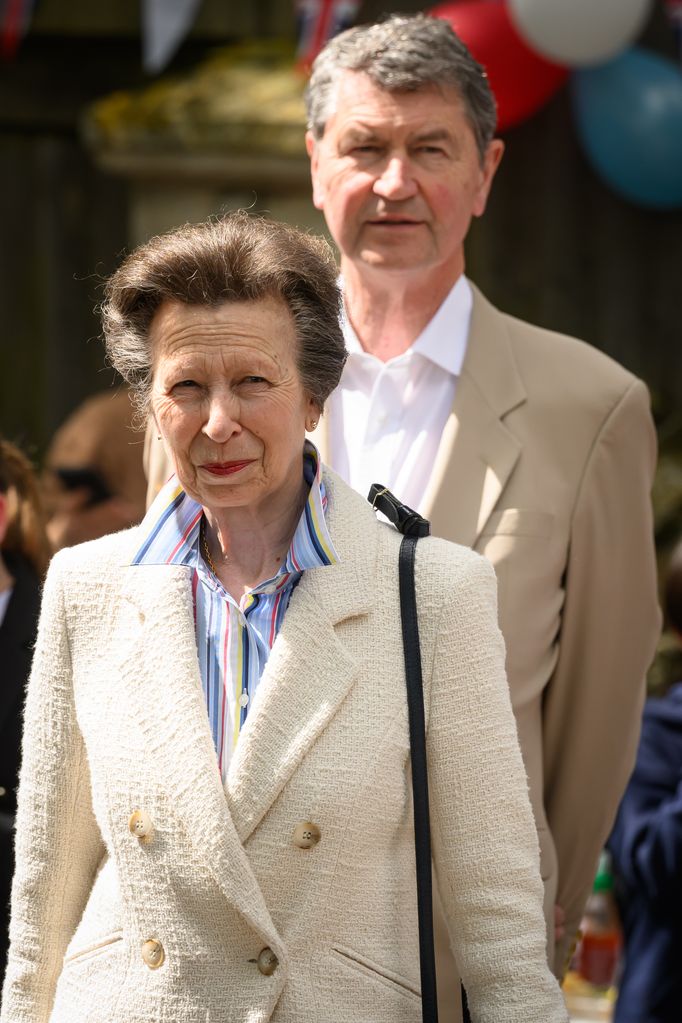 Princess Anne and Sir Tim Laurence taking a walk