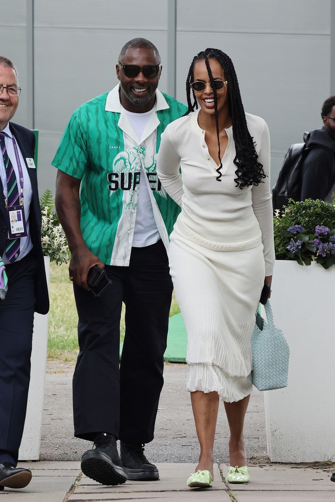 LONDON, ENGLAND - JULY 16: Idris Elba and Sabrina Dhowre Elba attend day fourteen of the Wimbledon Tennis Championships at All England Lawn Tennis and Croquet Club on July 16, 2023 in London, England. (Photo by Neil Mockford/GC Images)