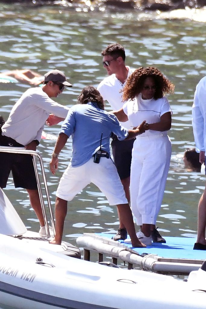 Oprah looks incredible in chic white ensemble