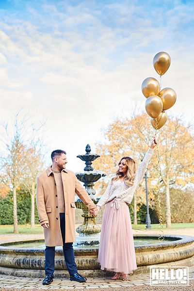 Amy Dowden holds balloons and her husbands hand