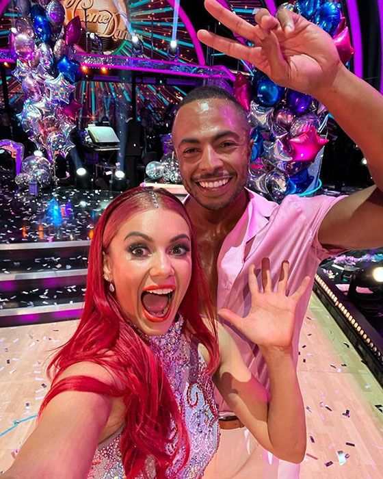Dianne Buswell and Tyler West posing on the Strictly dancefloor
