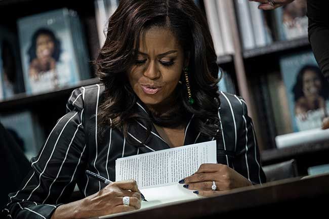 michelle obama signing book
