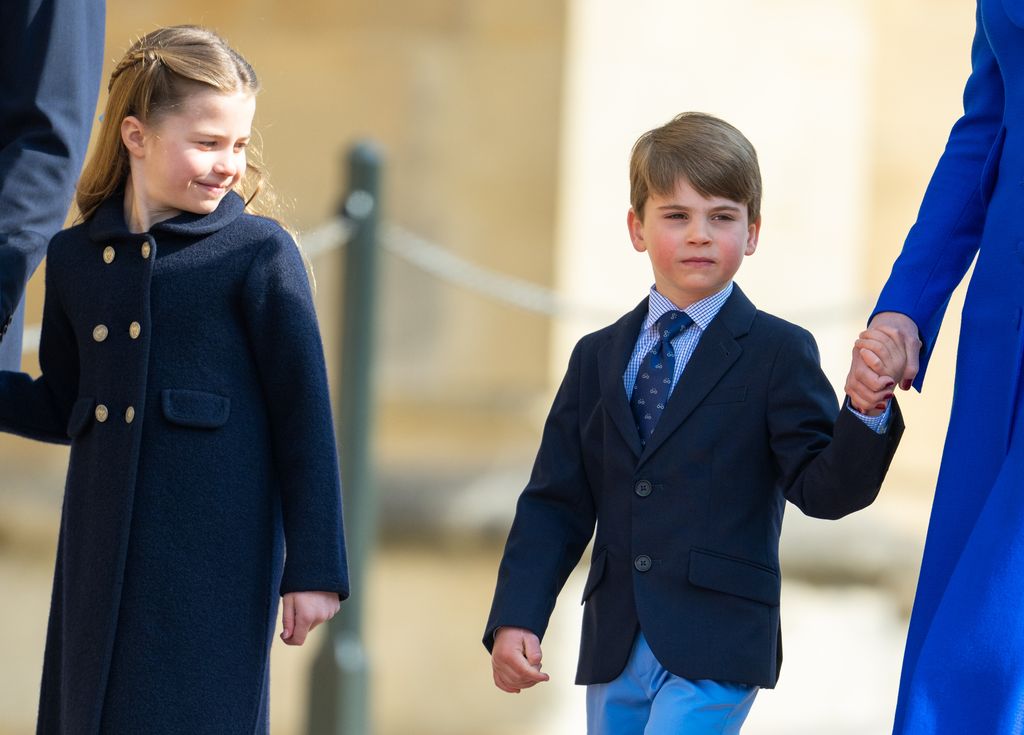 Princess Charlotte and Prince Louis walking