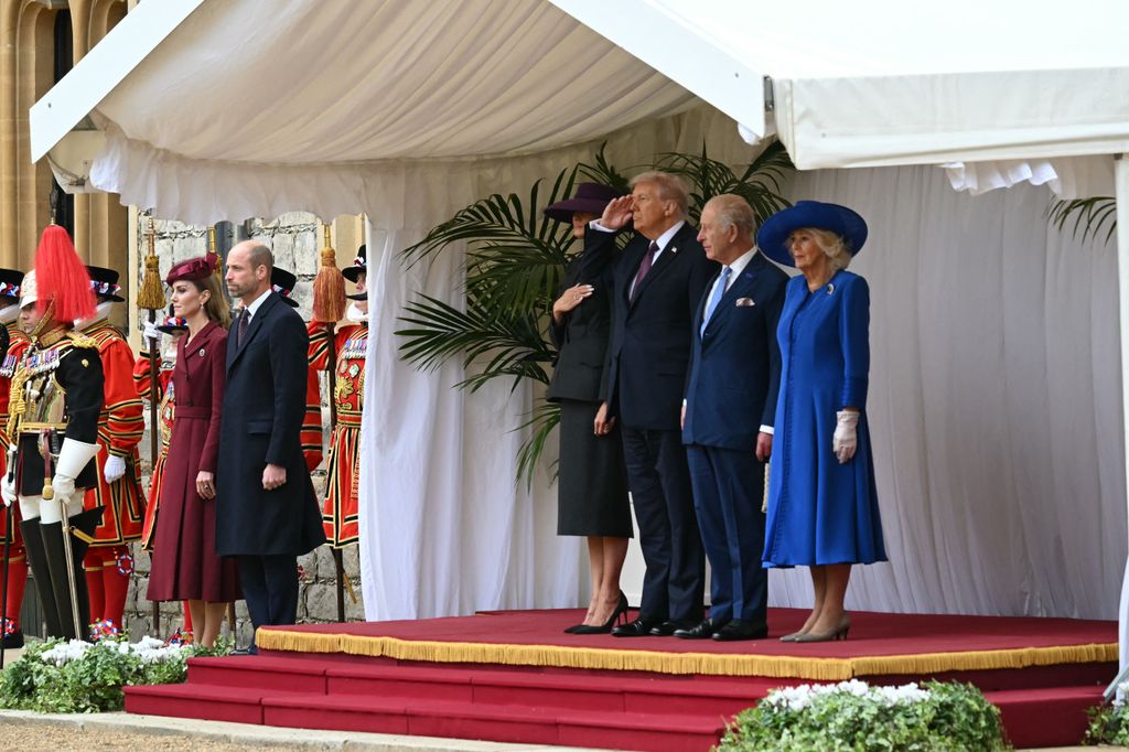 First Lady Melania Trump, US President Donald Trump, King Charles and Queen Camilla stand on the dias with the Prince and Princess of Wales