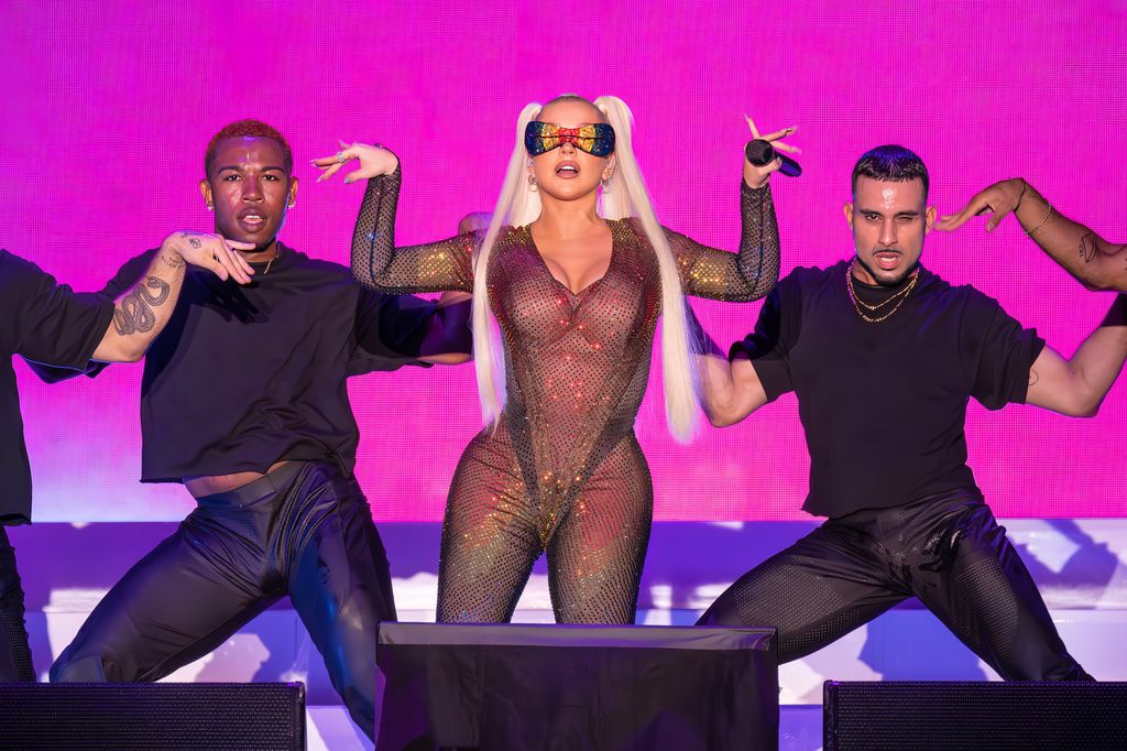  Christina Aguilera performs during Pride Island in a glitter bodysuit