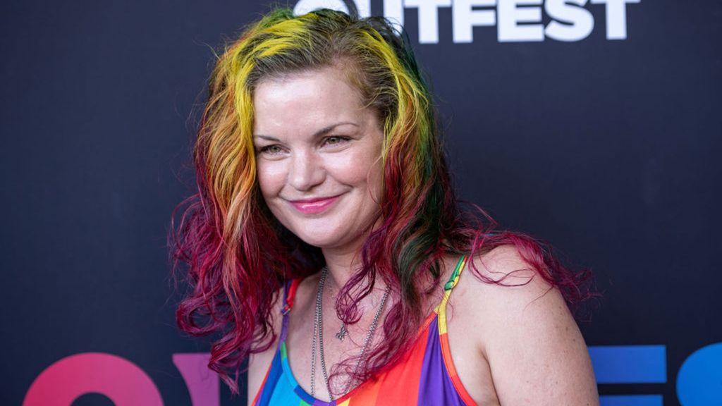 Pauley Perrette wearing a rainbow dress