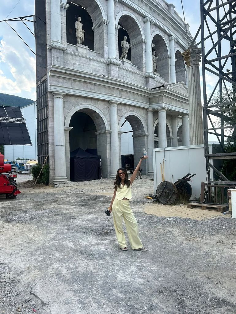 Michelle Keegan posing outside her film set in Bulgaria