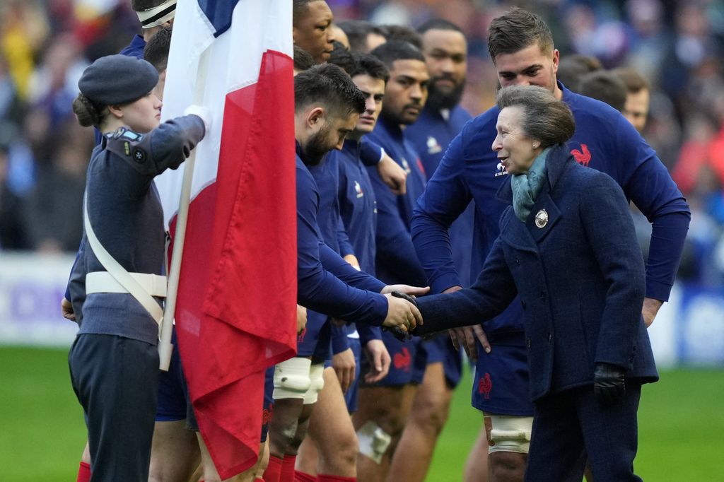 Britain's Princess Anne, Princess Royal (R) is introduced to the France players ahead of the Six Nations international rugby union match between Scotland and France at Murrayfield Stadium in Edinburgh, Scotland on February 10, 2024. (Photo by Andy Buchanan / AFP) (Photo by ANDY BUCHANAN/AFP via Getty Images)