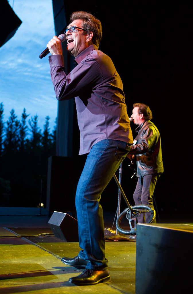 Huey Lewis of Huey Lewis and the News performs during his "SPORTS" 30th Anniversary Tour at the Freedom Hill Amphitheater on June 4, 2013 in Sterling Heights, Michigan