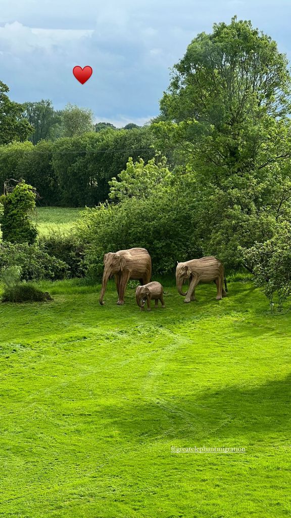 The elephants now live on the grounds of their gargantuan family garden