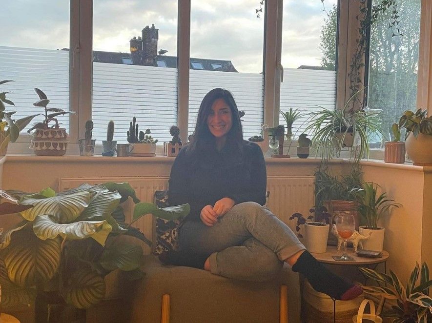 angelina in her lounge with plants