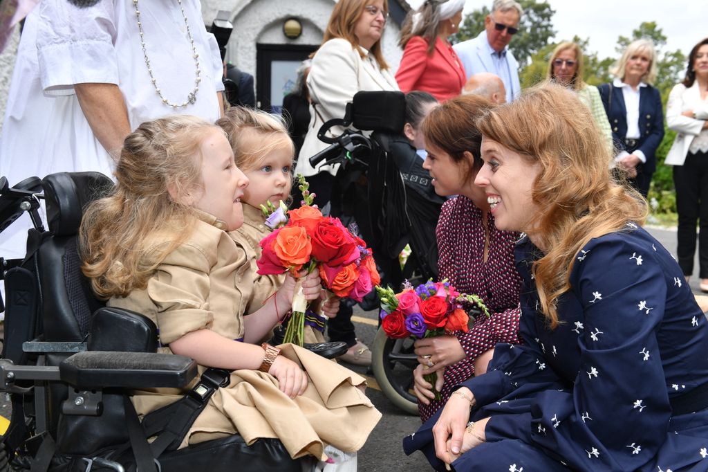 Beatrice and Eugenie were given flowers from Annabelle and Eva Thomas