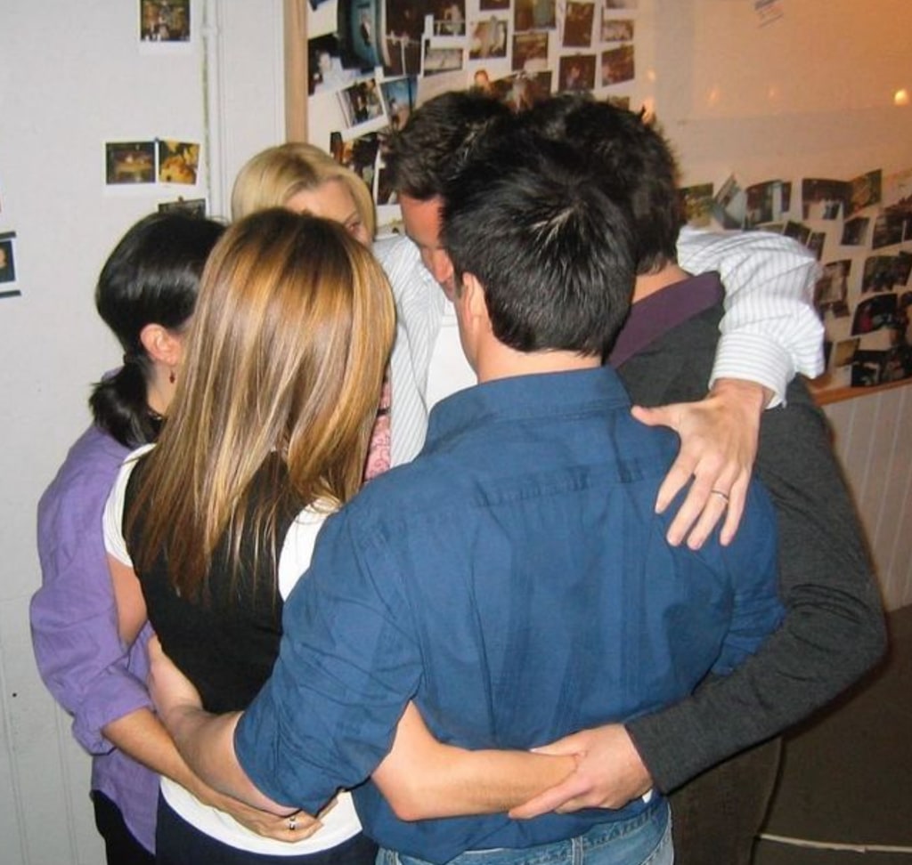 Photo shared by Jennifer Aniston on Instagram October 28, 2024 in honor of the one-year anniversary of Matthew Perry's passing, in which the entire Friends cast is in a group hug