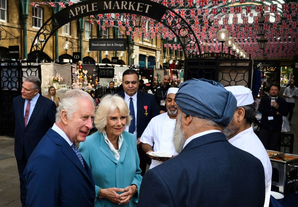 The King and Queen meet members of the local community and business owners, in Covent Garden