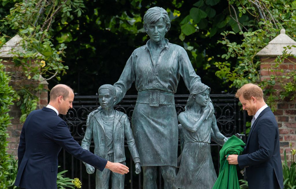 Prince William and Prince Harry unveiling a statue in honour of Princess Diana