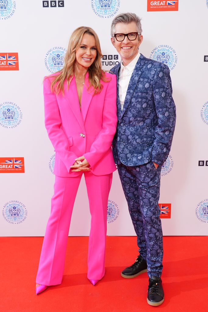 amanda holden in hot pink suit with gareth malone at king charles coronation concert at windsor castle