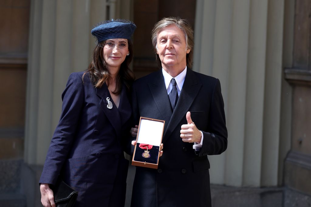 paul with wife nancy at buckingham palace 