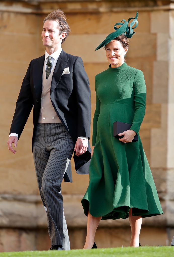 Pippa Middleton in a green outfit walking beside james matthews