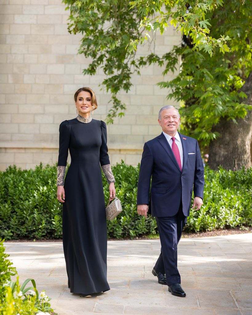 Queen Rania, in Dior, alongside her husband King Abdullah