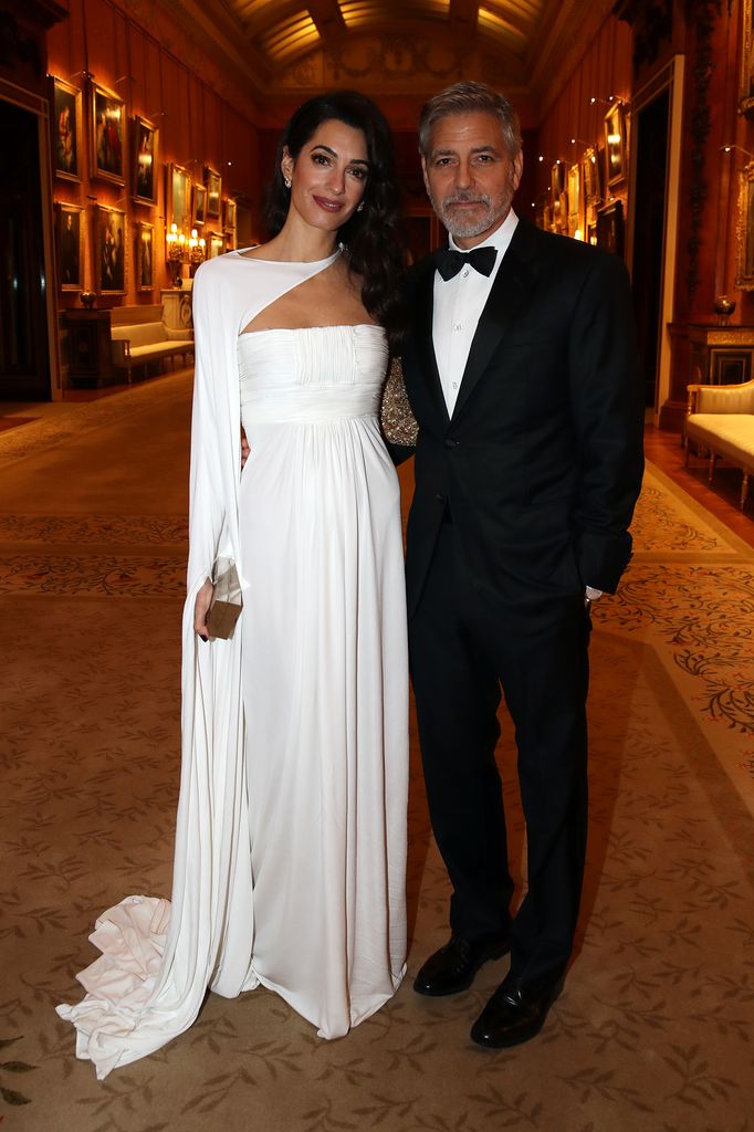 Amal Clooney and George Clooney attend a dinner to celebrate The Prince's Trust, hosted by Prince Charles, Prince of Wales at Buckingham Palace on March 12, 2019 in London, England