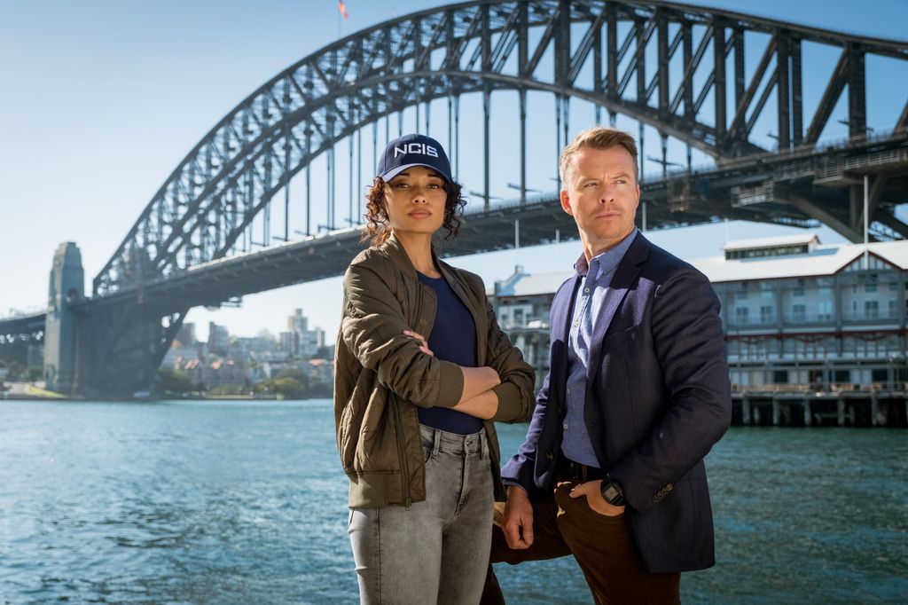BTS of Olivia Swann as NCIS Special Agent Captain Michelle Mackey and Todd Lasance as AFP LiaisonÂ Officer Sergeant JimÂ  'JD'Â Dempsey, on the set of NCIS: Sydney season 1.