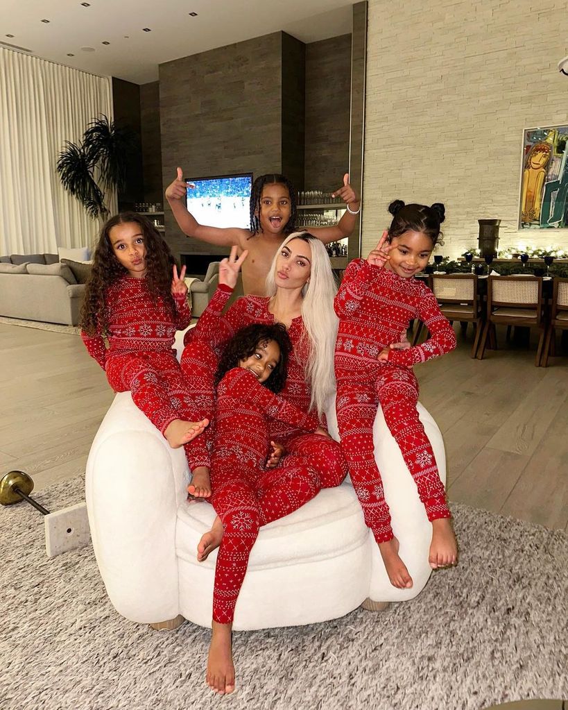Kim with her and Kanye's four children in Christmas onesies