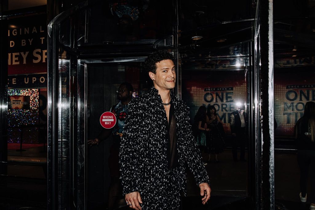 For opening night of 'Once Upon a More Time,' Justin Guarini wore a suit by Atelier Cillian, shoes by Taft, and jewels by Versani NY. Styled by Greg Dassonville for DassonVogue