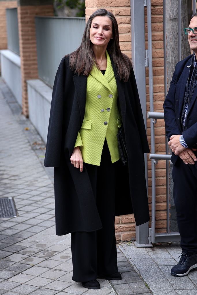 Queen Letizia lime green blazer and black coat